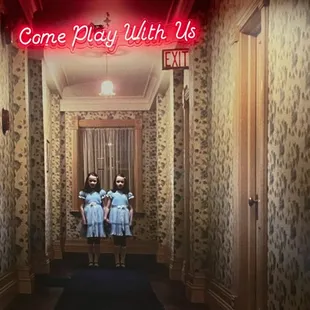 Inspired by the movie, The Shining, the Edina Theatre features a fun Grady Girls mural in the staircase up to the Gold Room Bar.