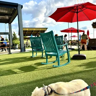 Dog friendly inside &amp; out (there&apos;s no kitchen), great fake grass area w/ rocking &amp; Adirondack chairs, stage with live music &amp; food trucks