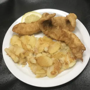 Hand battered fish with crispy home fries!