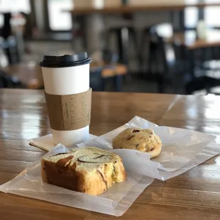 a cup of coffee and two pastries