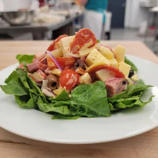 a salad on a white plate