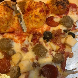 Meat lovers pizza with olives!