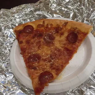 Slice of pepperoni pizza