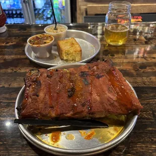 Full rack of ribs with two sides.
