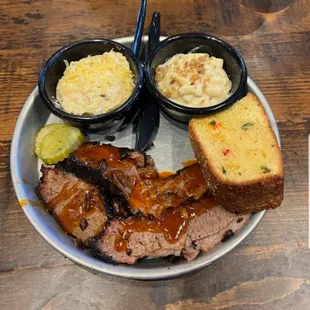 Brisket Platter (Brisket 8.8/10) Left- Grits 9/10) Mac &amp; Cheese 8.2/10) Cornbread 8/10)