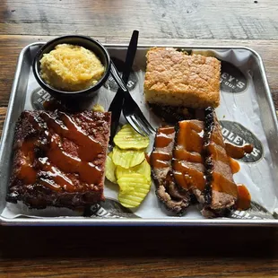 Ribs on bottom left. Fall of the bone tender( 9/10 ) Brisket on bottom right  (8.8/10 ) Kiss my GRITS on top left ( 9/10 )