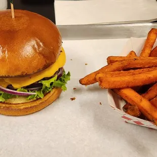 Double patty cheeseburger with sweet potato fries.