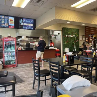 Small but cute. About 13 tables that fit 4 people each.