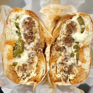 Chorizo egg and cheese on a bagel with added jalapeños