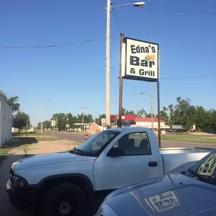 a sign for edna&apos;s bar and grill