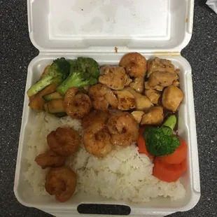 Chicken and shrimp with vegetables and steam rice.