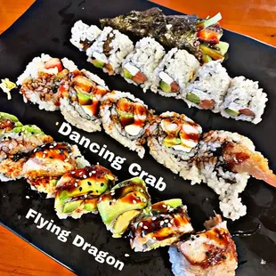 a plate of sushi rolls with the words philadelphia roll cucumber crab flying dragon