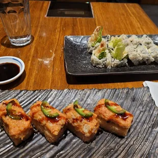 Crispy Rice topped with spicy salmon. Must try.