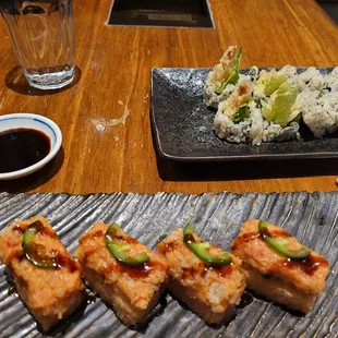 Crispy Rice topped with spicy salmon. Must try.