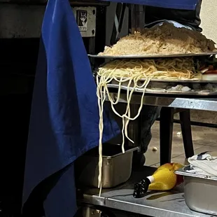 a chef preparing food in a commercial kitchen