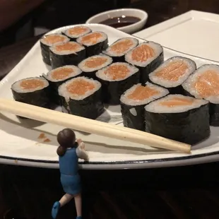 Fuchiko admiring the salmon roll.