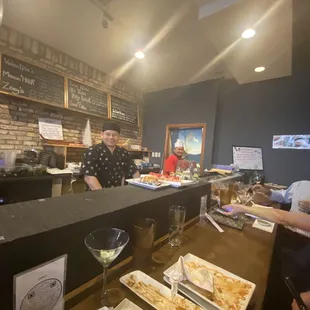 Sushi chefs . Very friendly and they make the best sushi :)