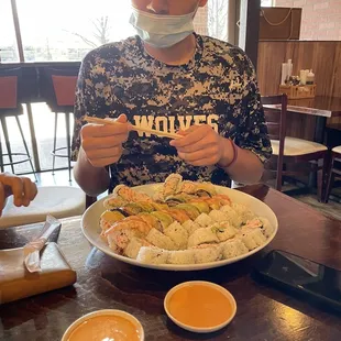 My son enjoying a plate of sushi at Edohana!