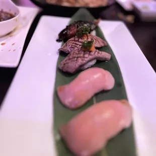 Hamachi, gyu, and unagi nigiri .