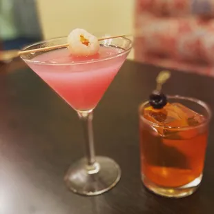 two cocktails on a table