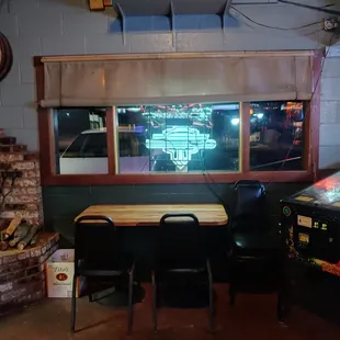 a pinball machine in the foreground