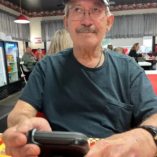 a man holding a cell phone