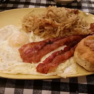 Two Eggs and Bacon with Hash Brown Casserole and Biscuit