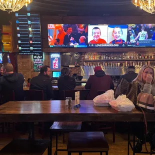 people sitting at the bar