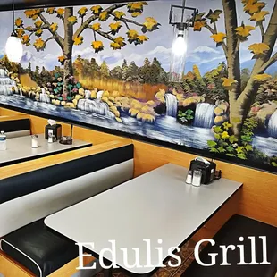 a mural of a waterfall