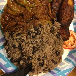 Ropa Verde with black beans and rice and cooked plantains.