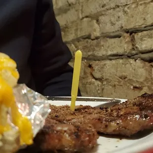 Extremely thin 'ribeye'...actually this photo makes it look bigger than it was.