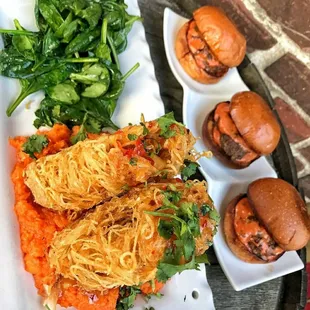 Potato Wrapped Snapper with Lamb Sliders,Delicious food and great Cocktails with Happy Hour and Live Music .