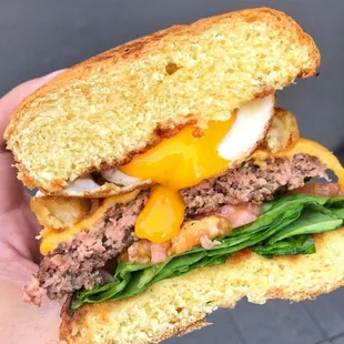 Yummy Edwin Burger w/ Onion ring ,Egg and it comes with house cut fries,Delicious food and great Cocktails with Happy Hour