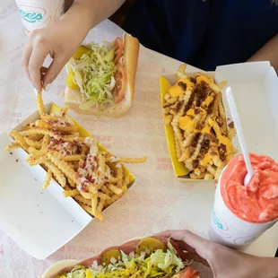 a table full of food and drinks