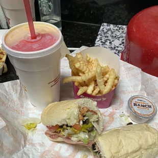 Deluxe grinder..really good! (switched it up from my normal pastrami), small fry, and medium piña colada/strawberry Eegee