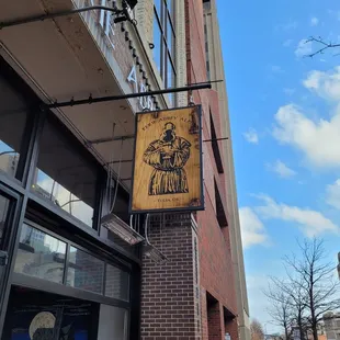 a sign on the side of a building