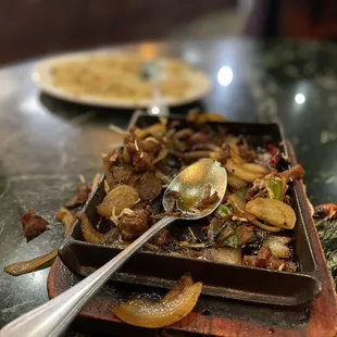 Sizzling Mongolian beef. Tender and very flavorful.