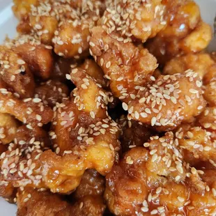 a plate of sesame chicken