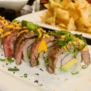 a sushi roll on a plate