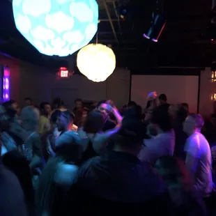 a large group of people dancing