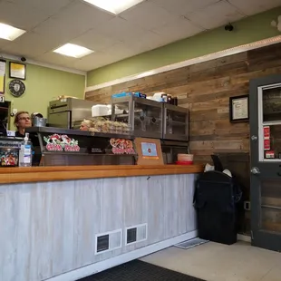 a woman behind the counter