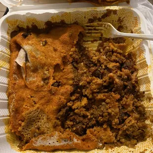 two take out containers of food
