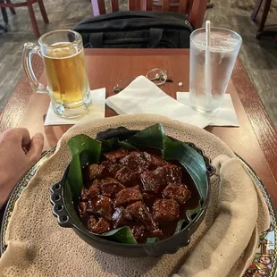 Gored Gored: cubes of tender raw beef seasoned with a dry spice rub called mitmita and a chili-mustard sauce called awaze