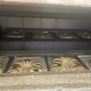 Delicious Rosca de Reyes. We have rellenas which come with walnuts and raisins inside and we also have the traditional which are just plain.