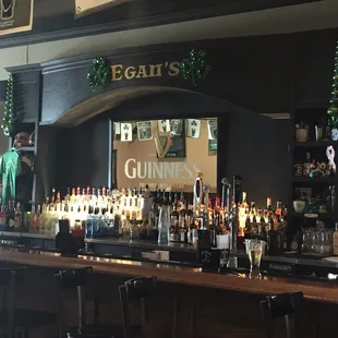 a bar with lots of bottles of alcohol