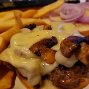 Big, handmade patty topped with mushrooms and swiss.