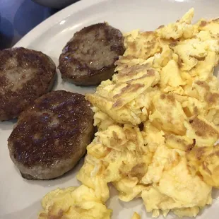 Hard scrambled eggs ( hubby likes them that way ) and their homemade sausage patties. Yummy!
