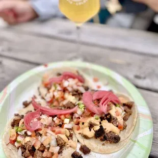 a plate of food on a picnic table