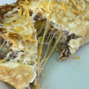 All the cheesyness with my Meat Lovers Omelettes
