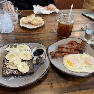 Banana French toast with bacon and eggs